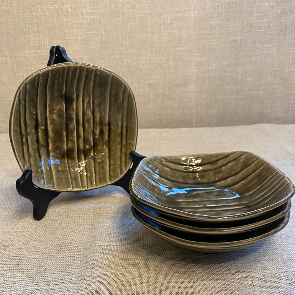 Set of four salad and/or dessert plates.